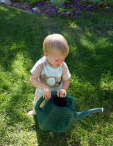 toddler-watering-from-imageBase